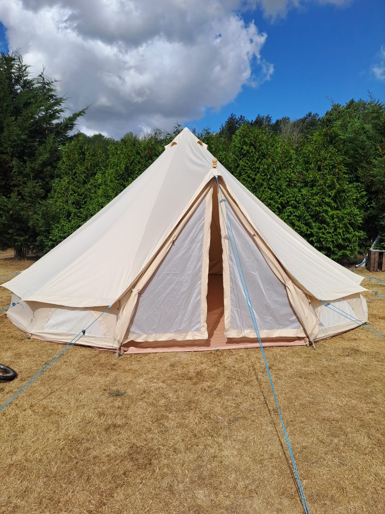Canvas bell tent pitched for a weekend celebration
